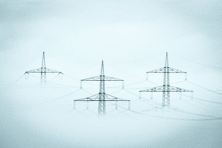 Transmission Lines peaking out through the fog